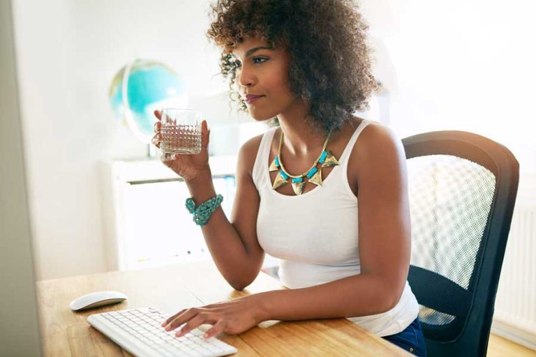 young woman drinking water